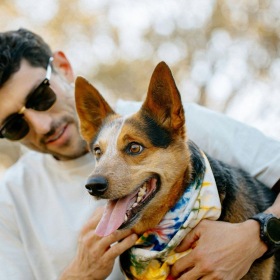 a person holding a dog